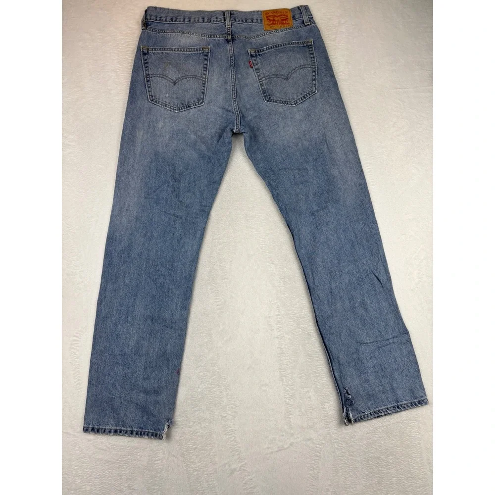 Levis 505 Mens 36x34 Jeans Light Blue Wash Denim Grungy HighLow Fade ripped Hem